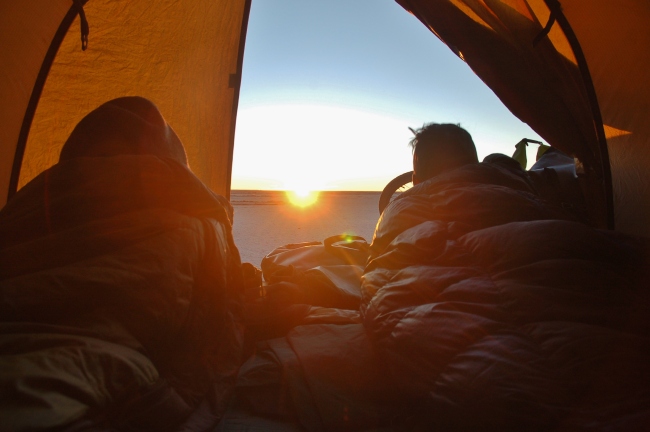 Sunrise on the Salar.  All 3 of us crammed into the tent for warmth.  